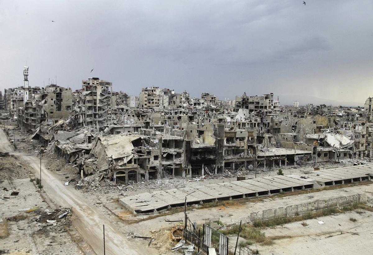 Homs distrutta dopo oltre due anni di assedio governativo, bombardamenti e combattimenti, 10 maggio 2014. Credits to: Reuters/Ghassan Najjar.