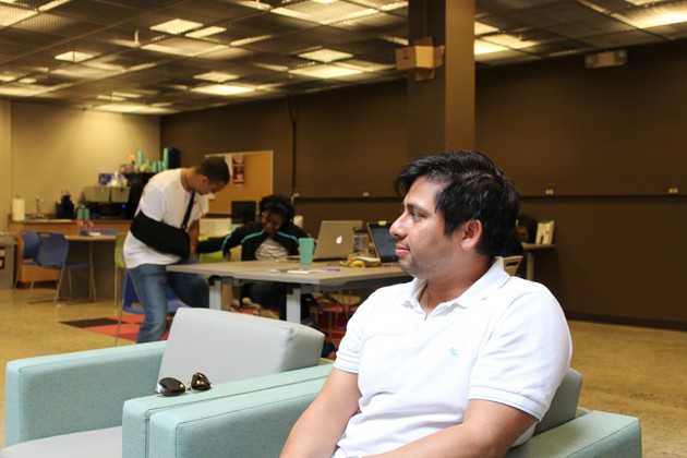 A man sits in an armchair