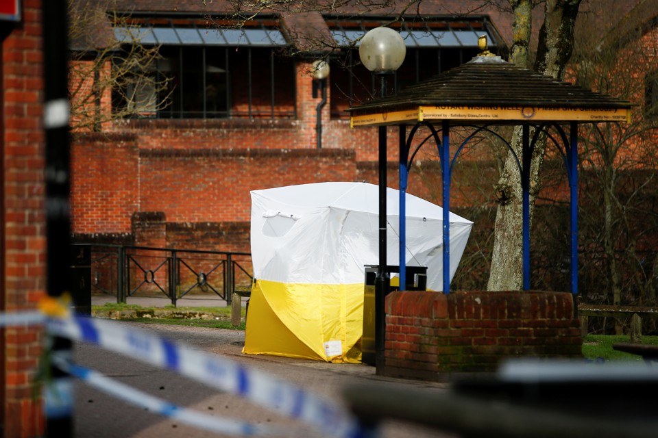 A tent covers the park bench where former Russian intelligence agent Sergei Skripal and his daughter Yulia were found after they were poisoned, in Salisbury, England.