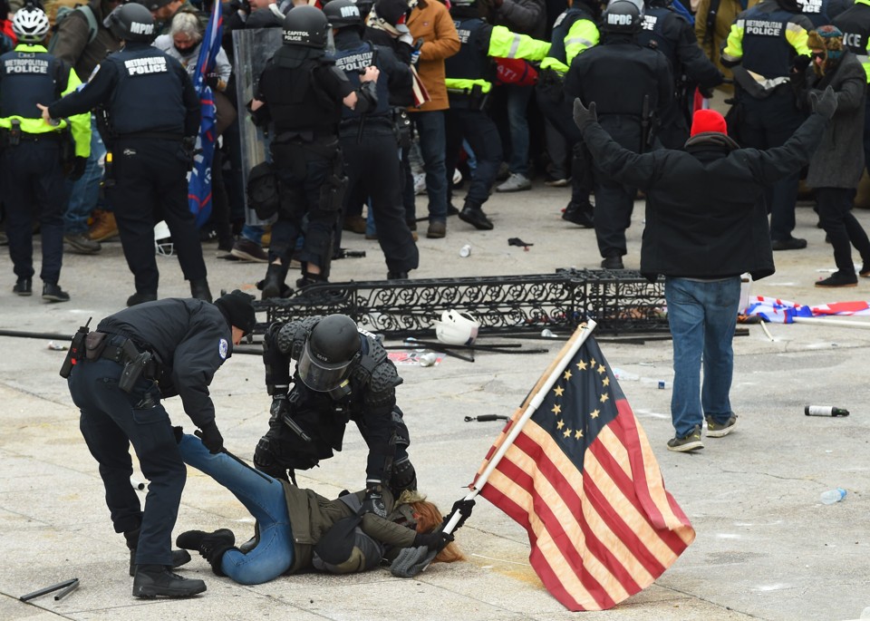 insurrectionist being arrested