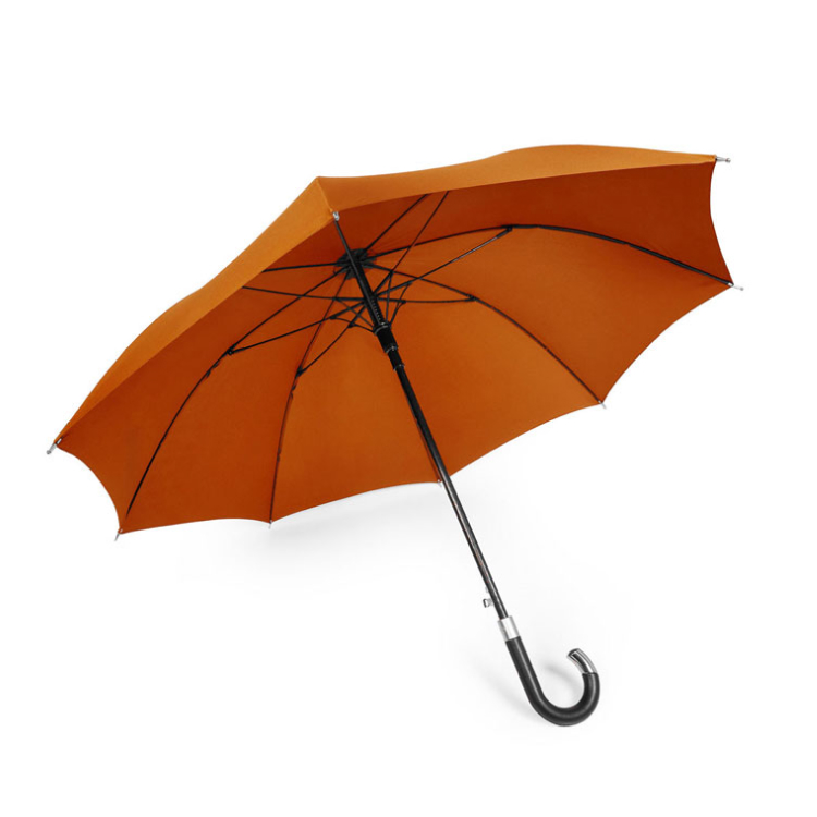 An orange umbrella with a black handle. 