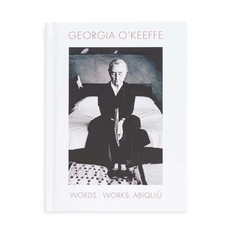 The cover of a book that features a black-and-white image of Georgia O'Keefe with the words "Georgia O'Keefe Words, Works" Abiquiú."