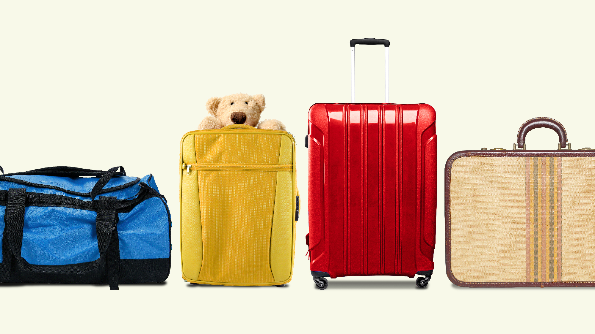 four different suitcases, one with a stuffed animal poking out