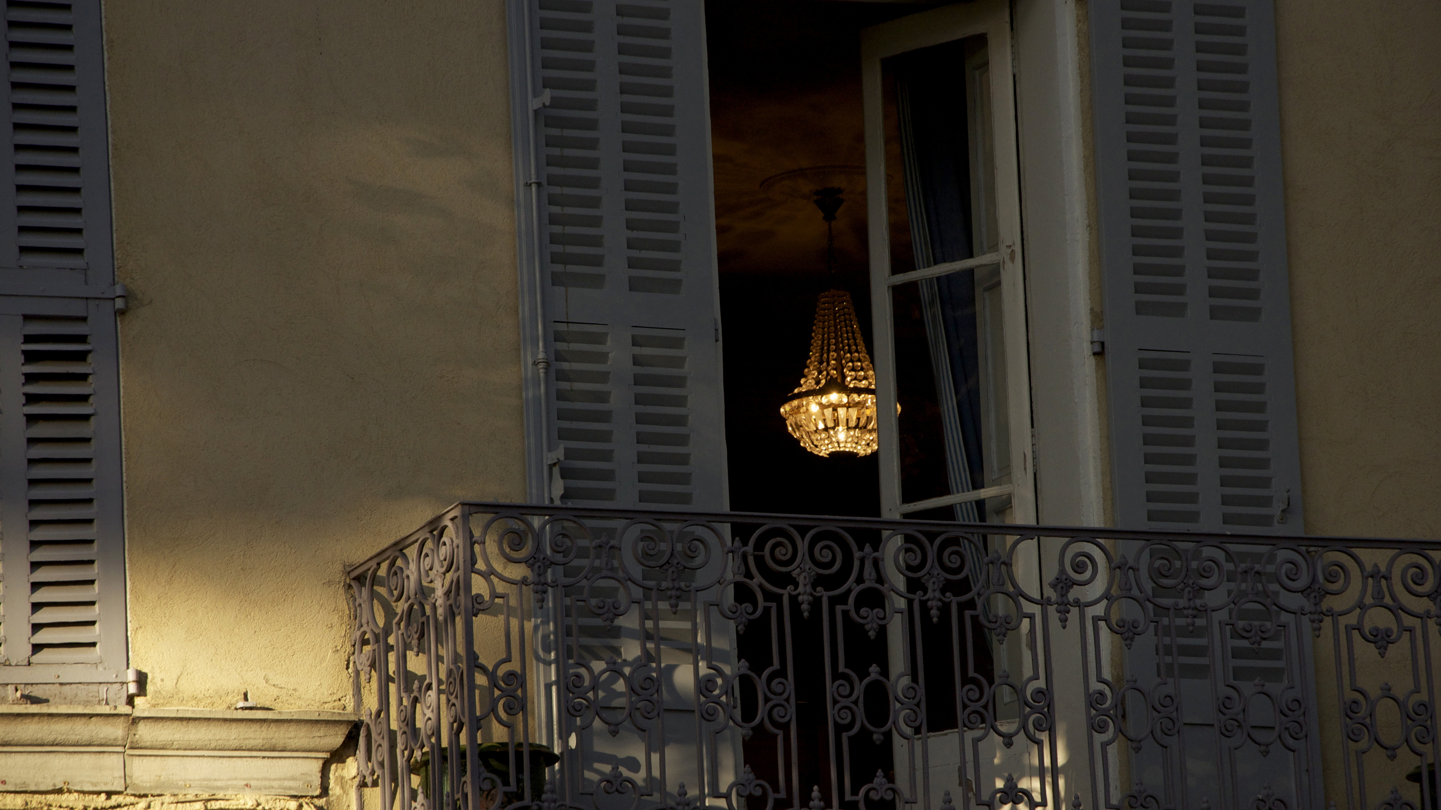 Photo of a balcony with an open window