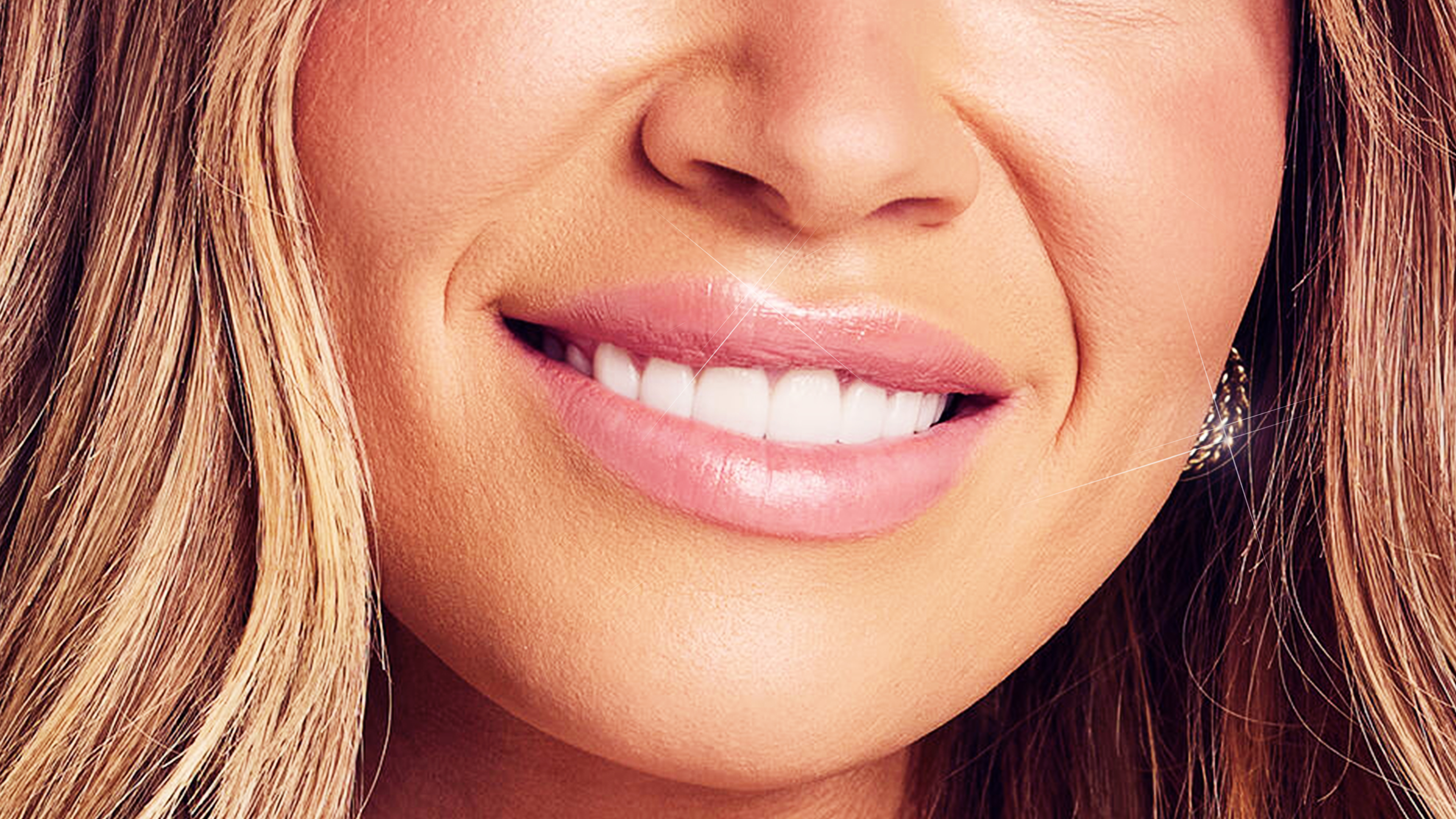 Lower half of a smiling woman's face