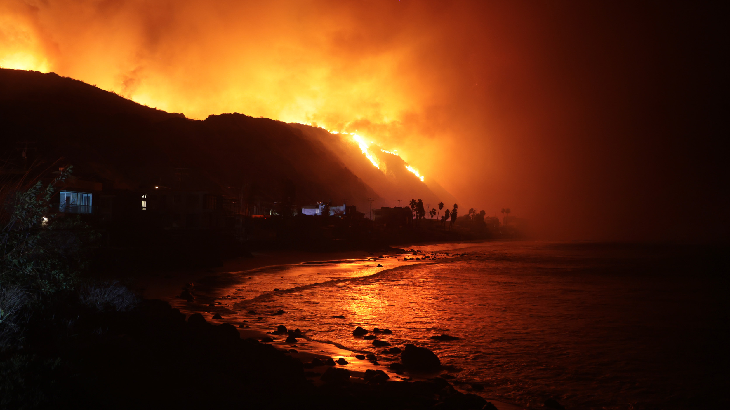 The Palisades Fire burns along the Pacific Coast Highway in Malibu, California, on January 8, 2025.