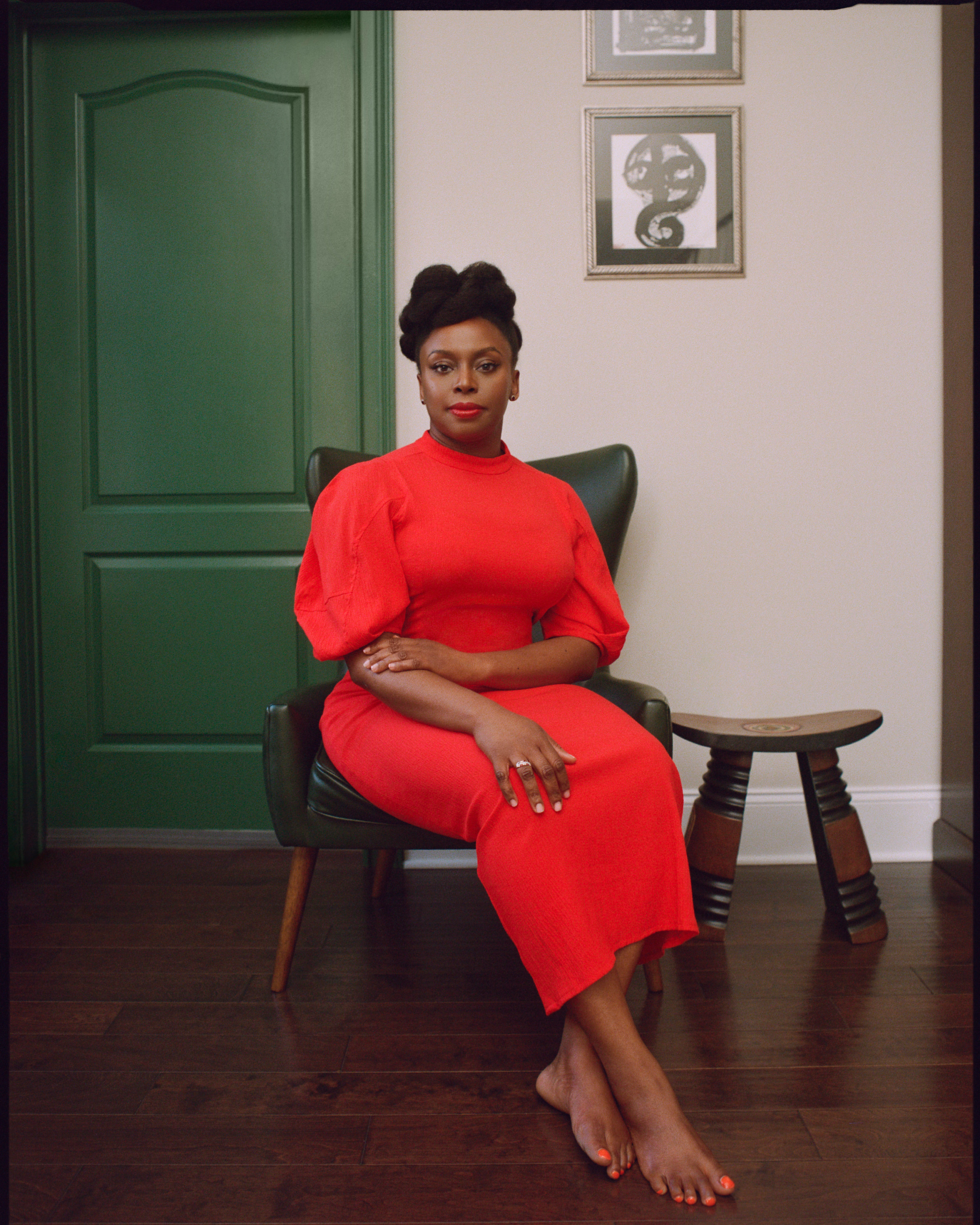 Photo of Chimananda Ngozie Adichie wearing a red dress