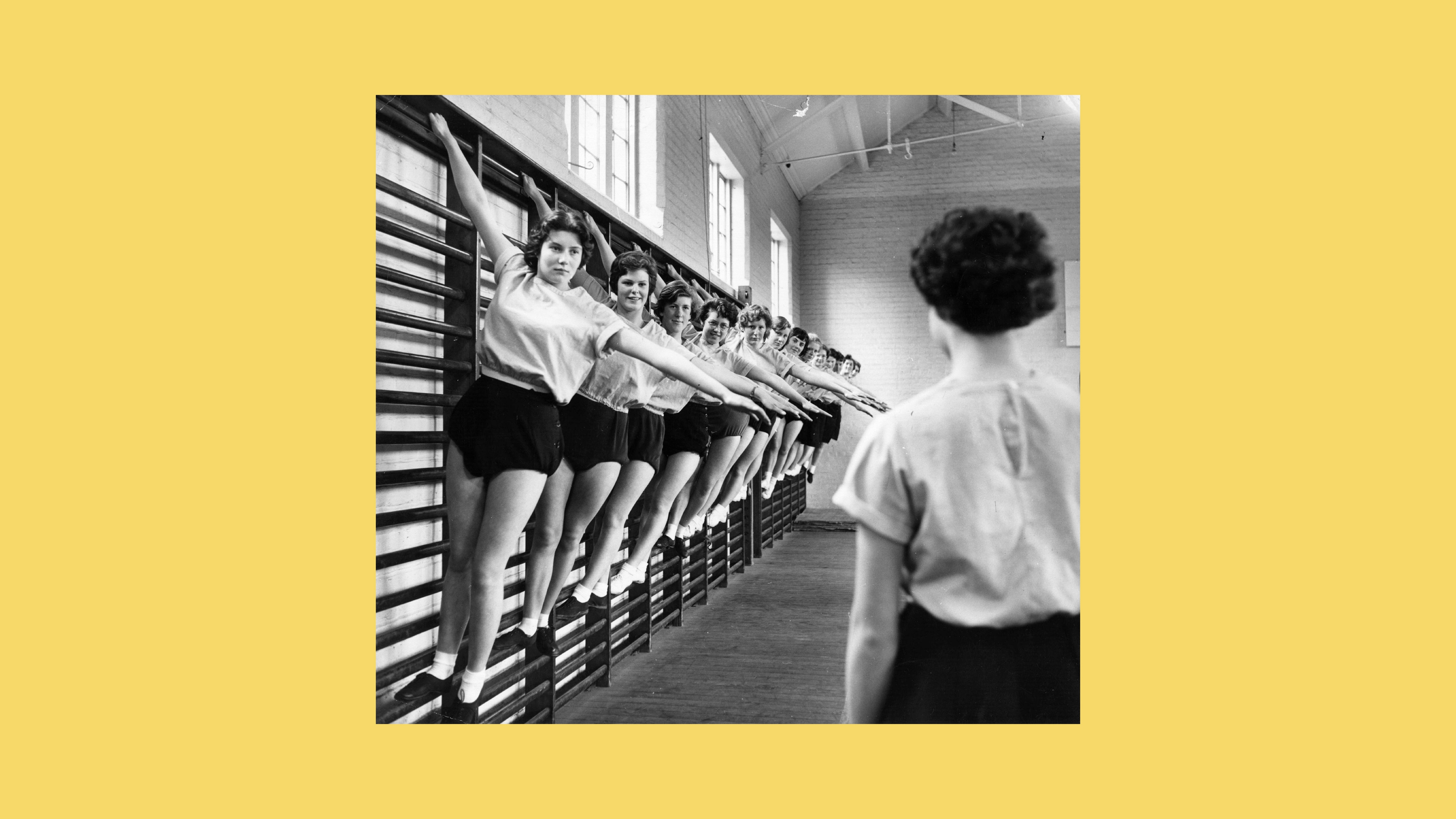 Photo of women doing exercises while a coach watches them