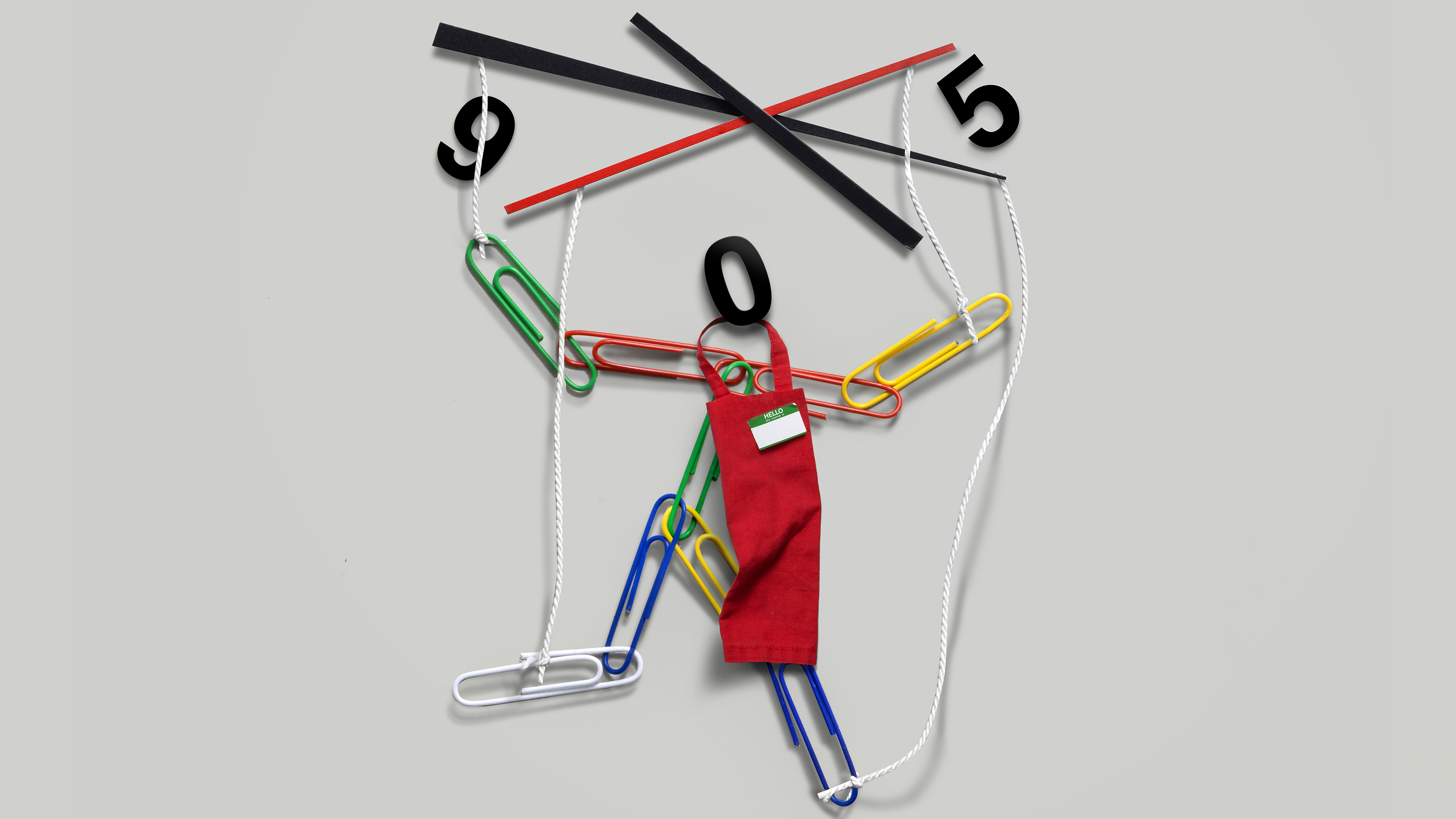 Marionette made of paperclips and the hands of a clock.