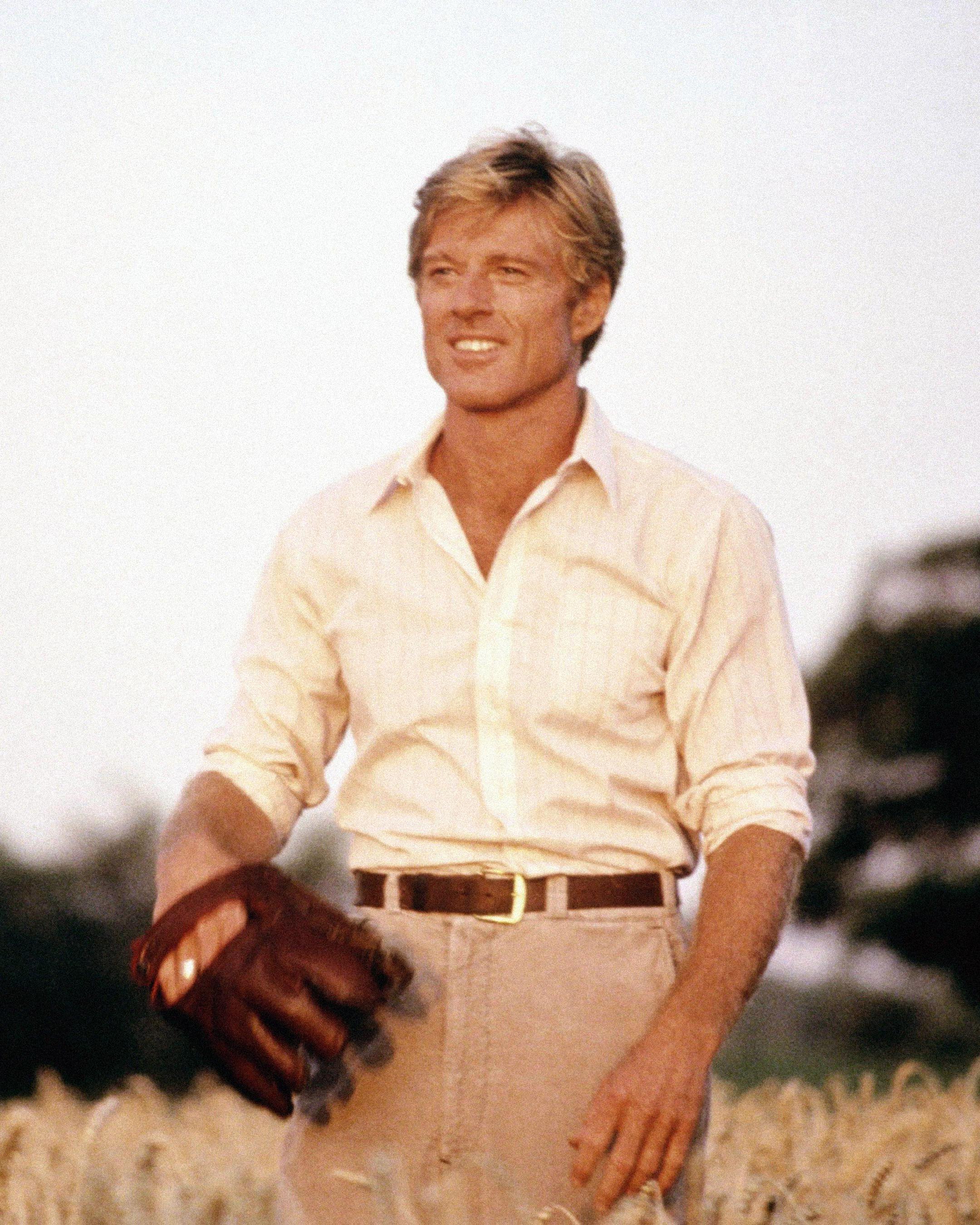 color photograph of Robert Redford in a field