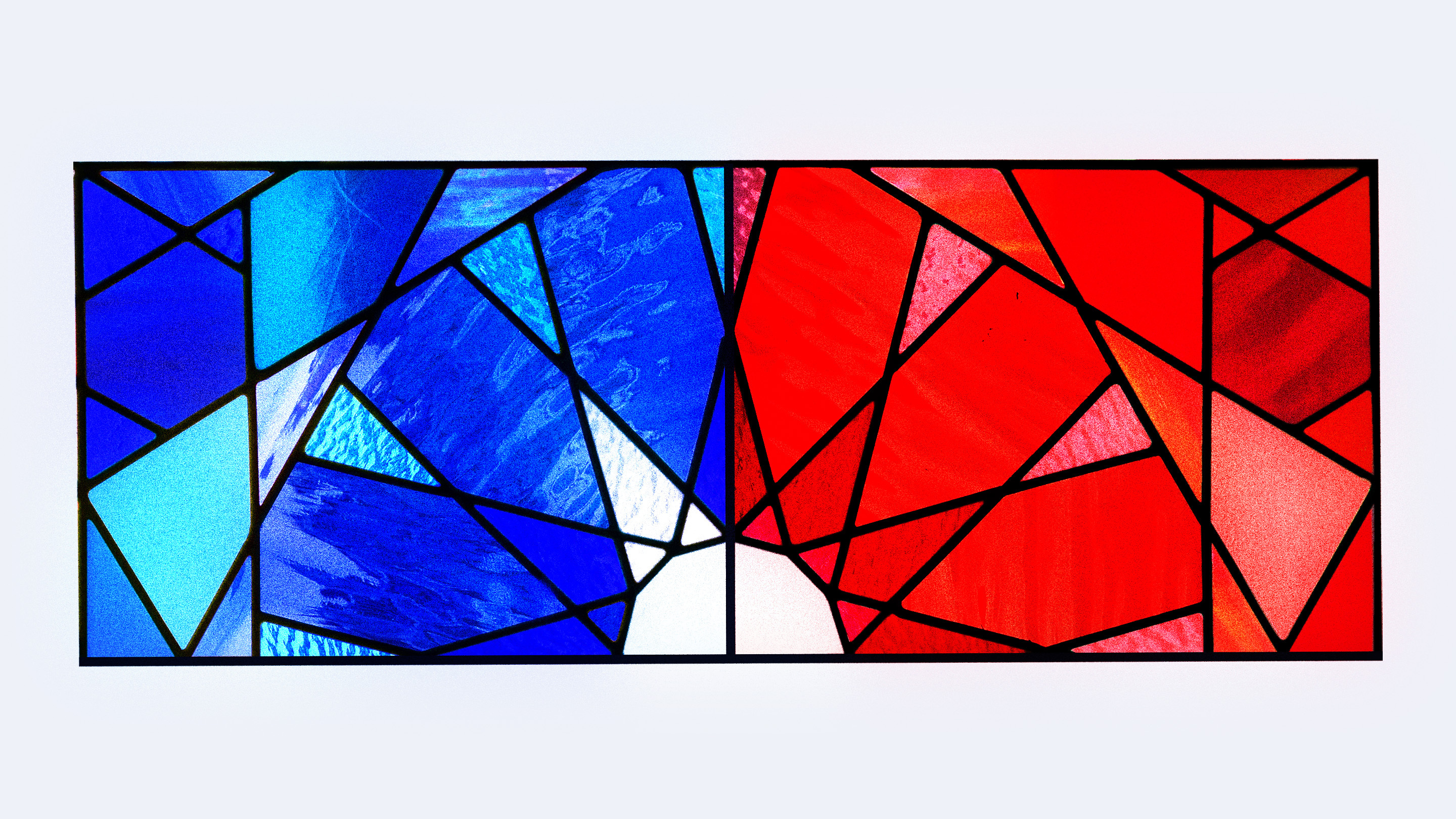 Illustration of a stained glass window with a blue-tinted left side and a red-tinted right side. An arrow is pointing to the left side.