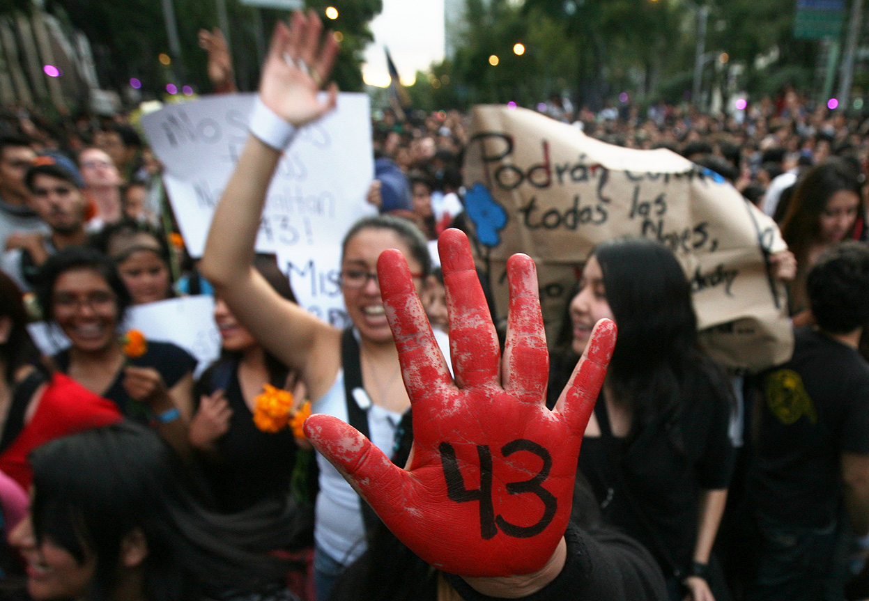 A file photo showing protests in Mexico City demanding justice for the 43 missing students from the Ayotzinapa Rural Teachers' College.