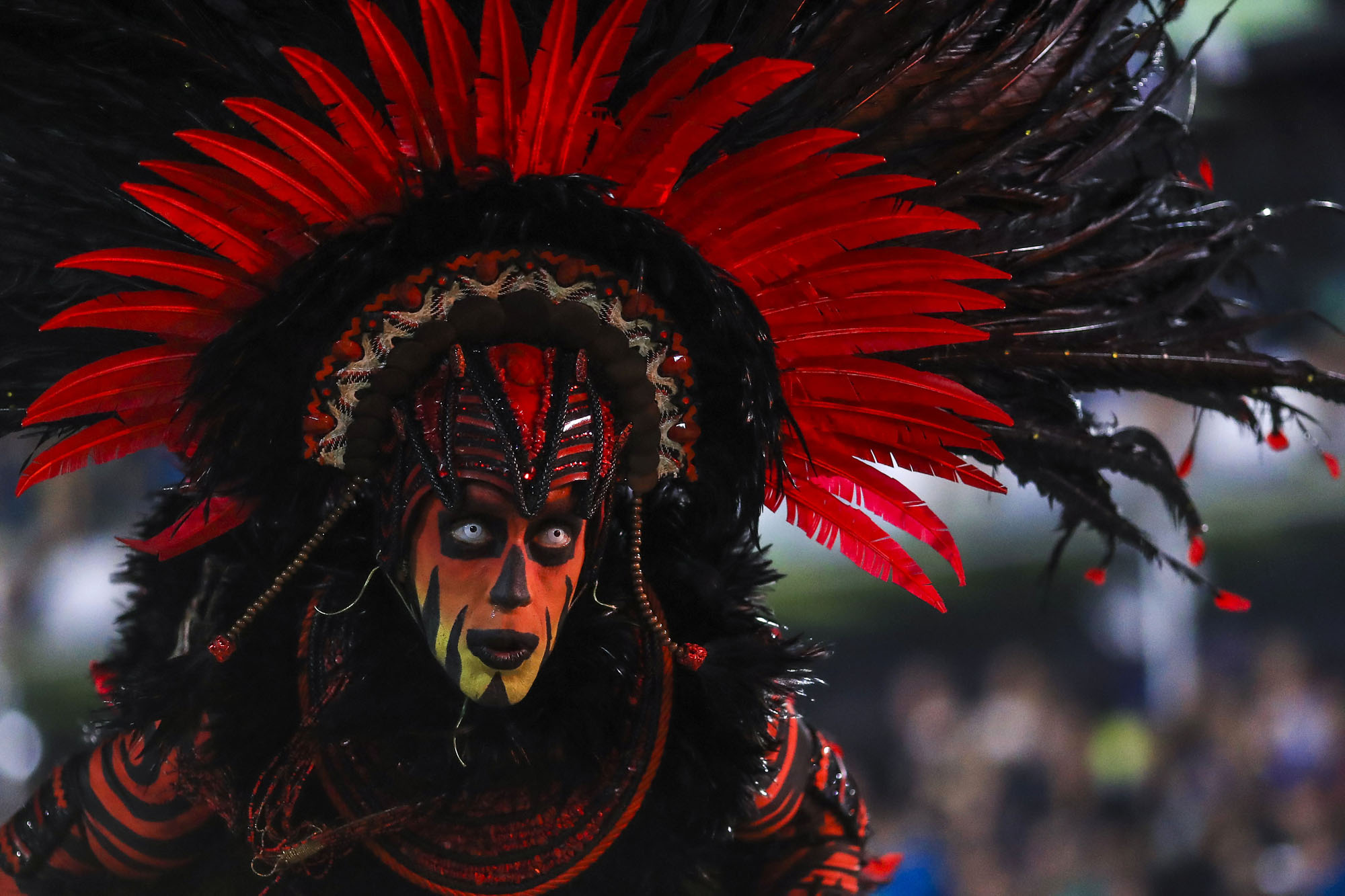 Three beautiful women in traditional brazilian carnival costumes