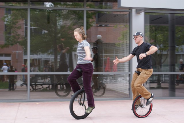 Julie and Matt on unicycles
