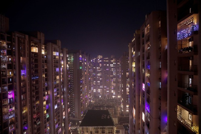 Decorative lights are seen on the balconies of a high-rise during Diwali in Noida, India