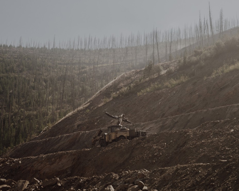 Heavy equipment working on mine operation.