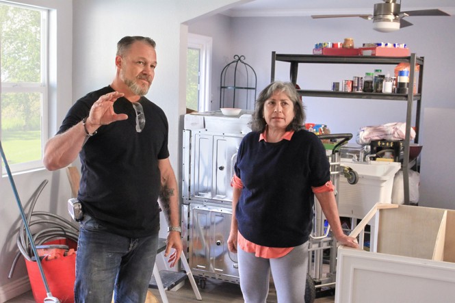 Host Tom Reber helps a homeowner on HGTV's 'Unfinished Business'