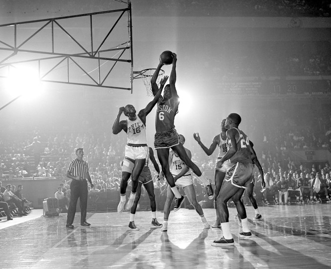 Bill Russell about to dunk.