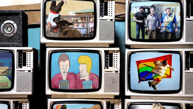 Stacks of TVs screening 'Beavis and Butthead,' 'Trailer Park Boys,' and 'Jackass'