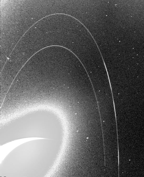 Neptune's delicate rings are visible in this 1989 image from the Voyager mission