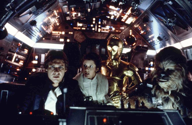 Harrison Ford, Carrie Fisher, die britischen Schauspieler Anthony Daniels und Peter Mayhew am Set von Star Wars: Episode V – Das Imperium schlägt zurück