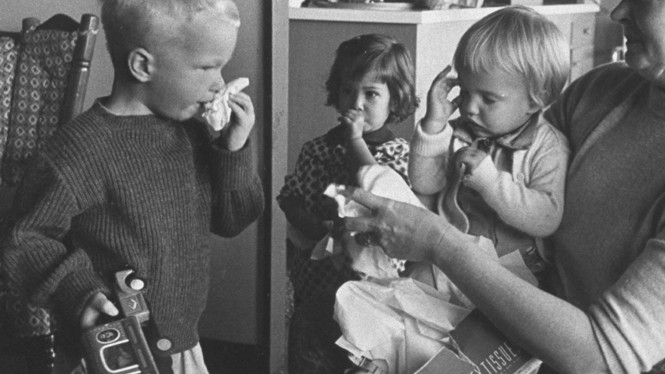 black and white photo of children with colds