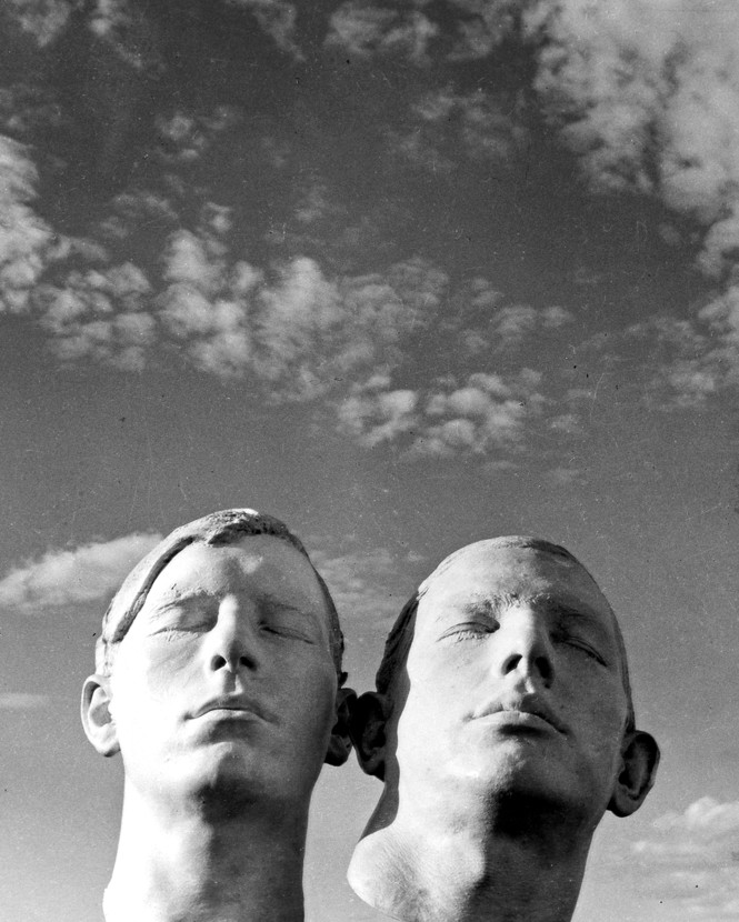 Two statue heads