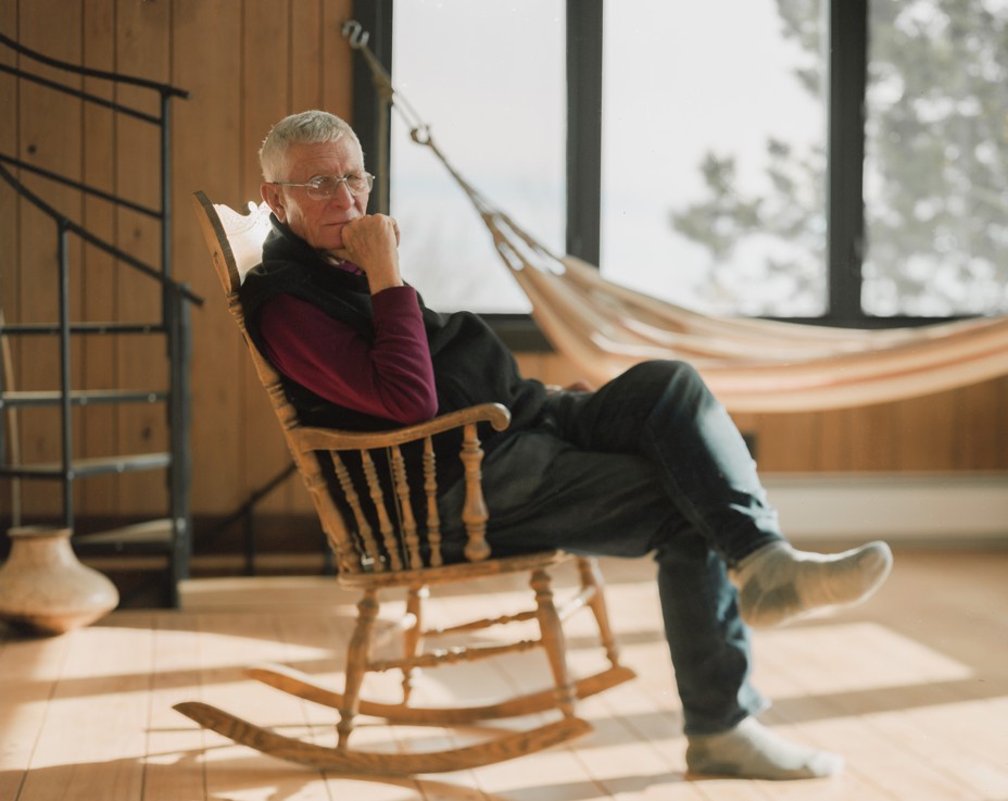 Picture of Warren Hern in his mountain house outside of Boulder, CO, which he and his father built together 50 years ago. 