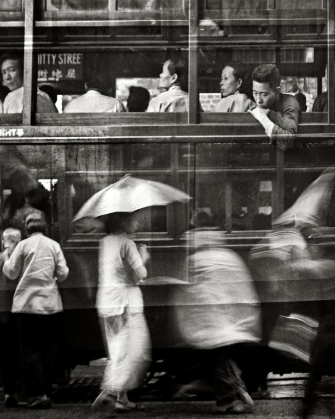 Black-and-white image of a Hong Kong street in the mid-20th century, taken by the Shanghainese photographer Fan Ho