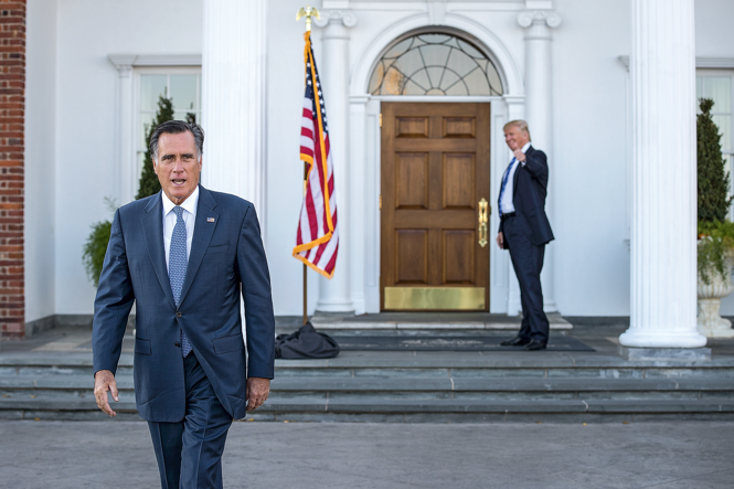 Mitt Romney and Donald Trump in front of the trump national golf course entrance.