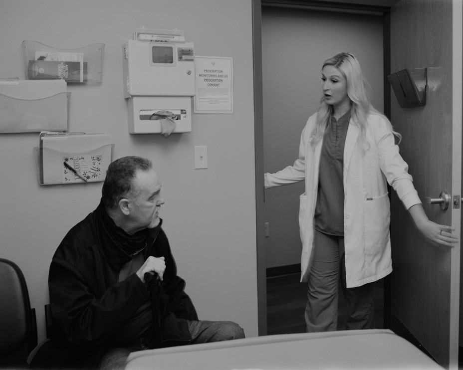 A doctor visits with a patient in The Health Wagon Office in Wise, Virginia on Tuesday, March 14, 2023. 