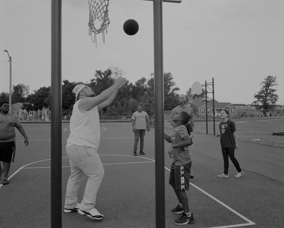Picture of Audre King and Damon Mendez playing basketball with participants from The REC in Luray, Virginia on Friday, June 16, 2023. 