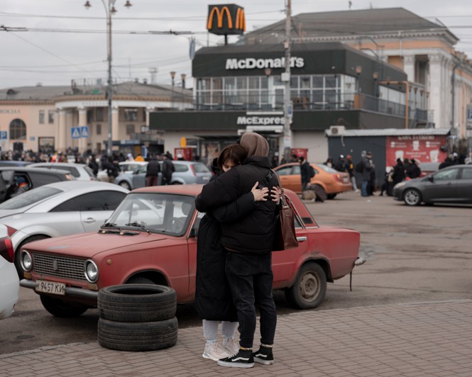 people hug goodbye