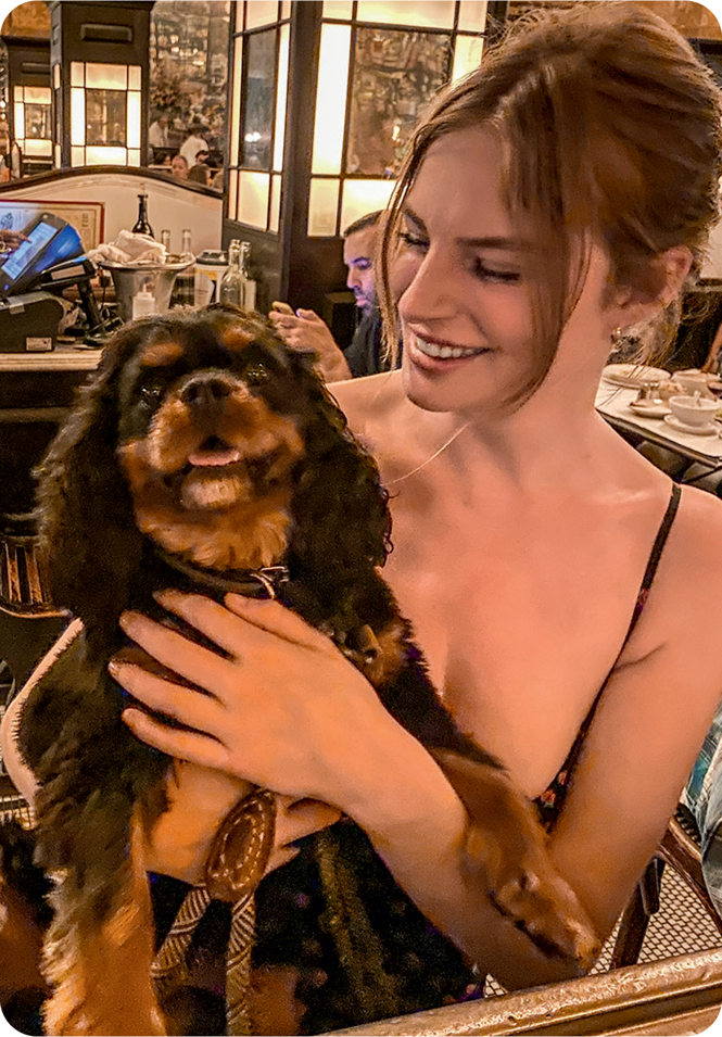 A photograph of Miranda and Ringo in a restaurant in NYC.