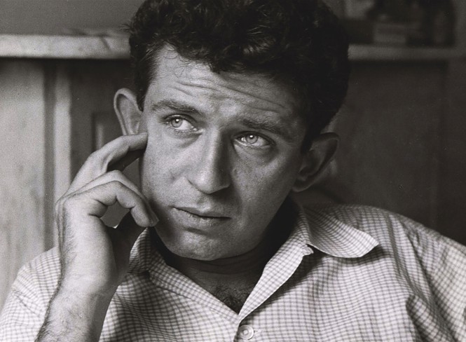 back and white close up of norman mailer's face looking off camera