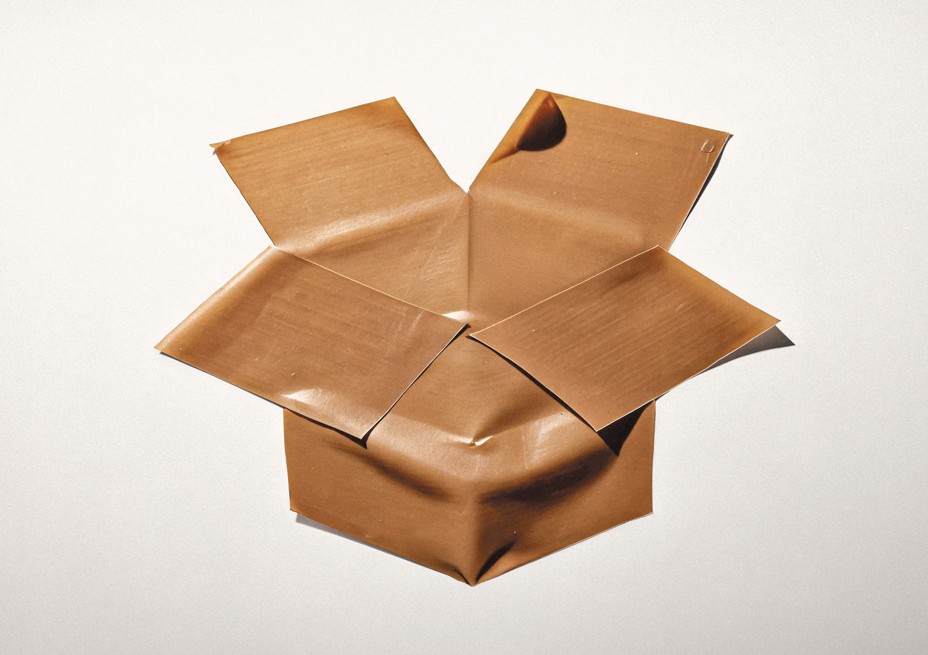 illustration of an open cardboard box, constructed from brown moving tape