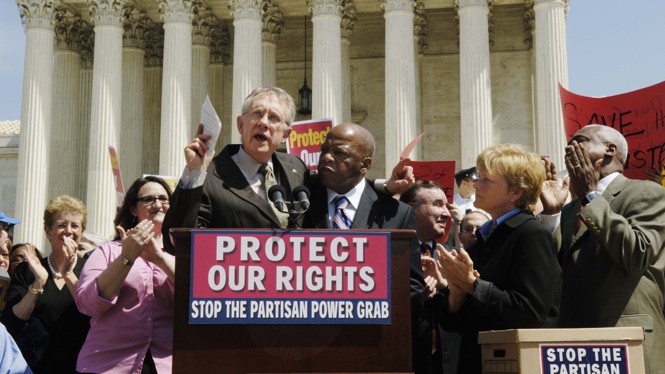 Senate Minority Leader Harry Reid, D-Nev., and Rep. John Lewis, R-Ga., during a "Rally to Stop the Partisan Power Grab" in front of the U.S. Supreme Court