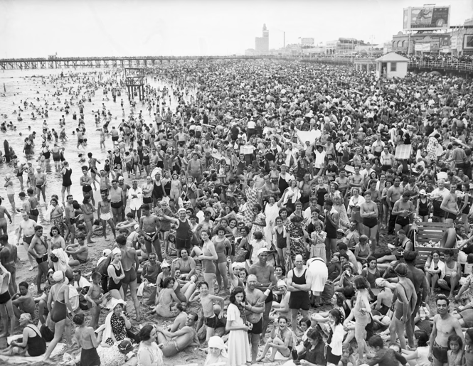 New Yorkers are shown as they packed the sands at Coney Island in 1938