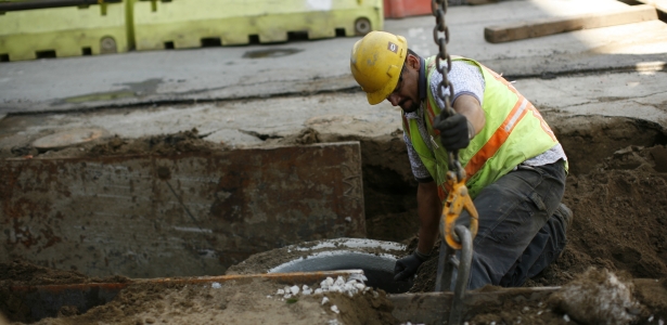 615 worker REUTERS Robert Galbraith.jpg