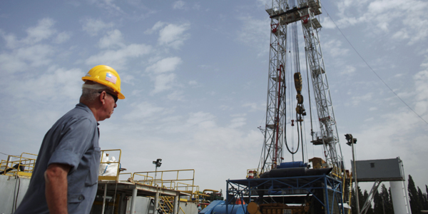Oil worker Texas - NIR ELIAS : Reuters - banner.jpg