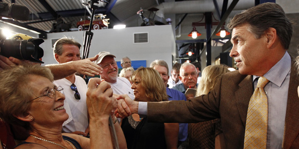 Rick Perry shaking hands - Jim Young : Reuters - banner.jpg