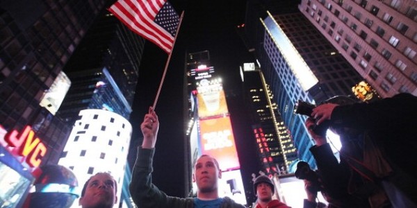 Flag waving times square - Getty - banner.jpg