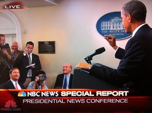 Obama pinching head.jpg
