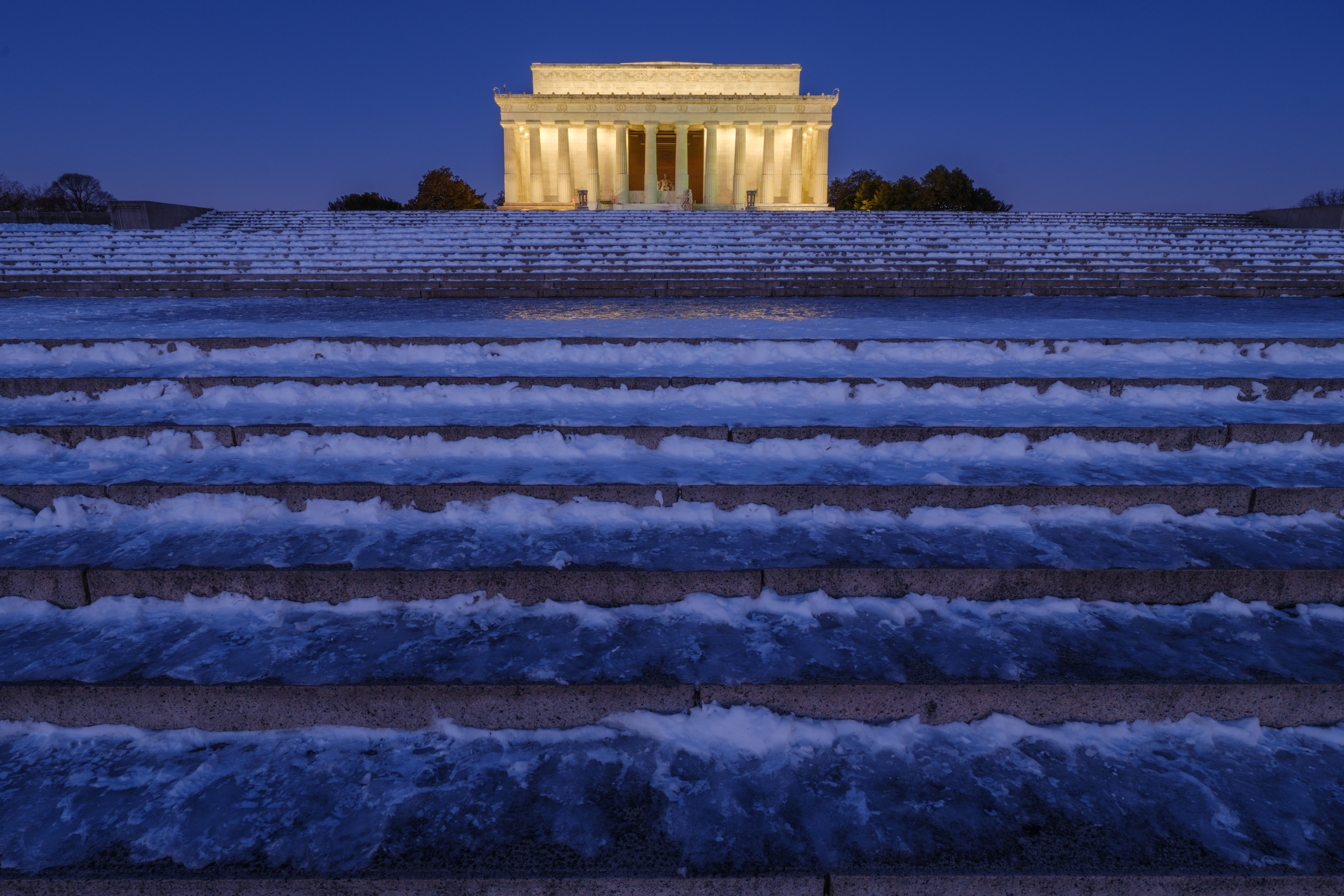 Ice and snow cover the steps leading to the Lincoln Memorial