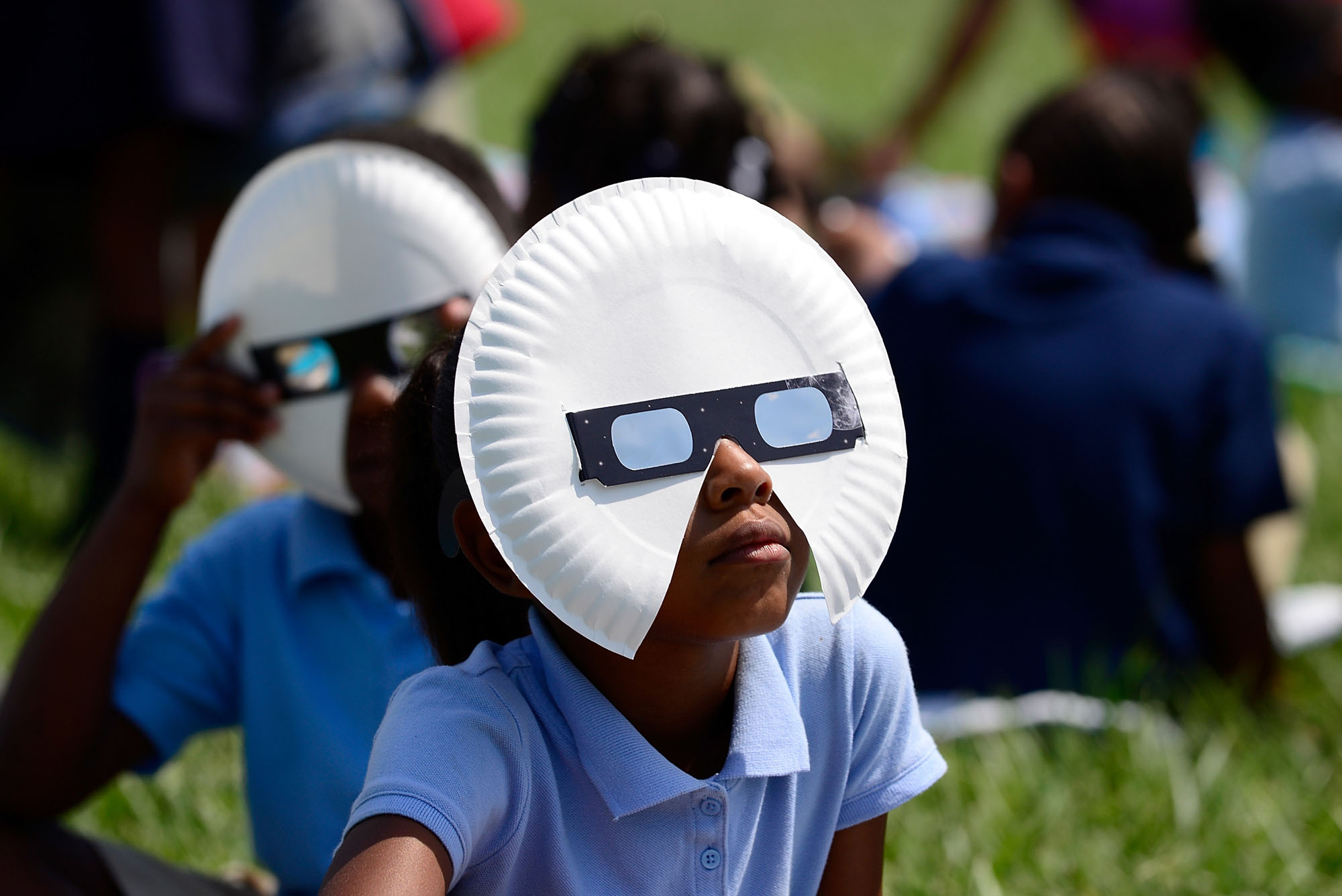 Students of the Jennings School District view a solar eclipse on August 21, 2017
