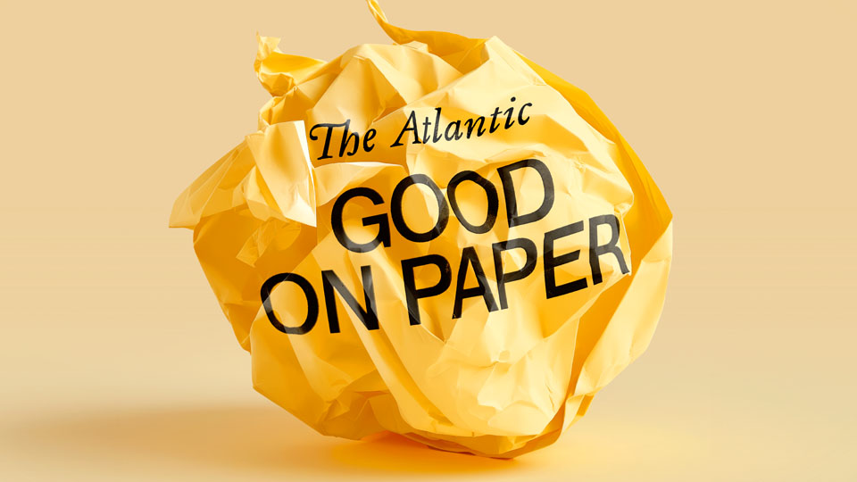 A crumpled up piece of yellow paper that reads "The Atlantic Good on Paper"