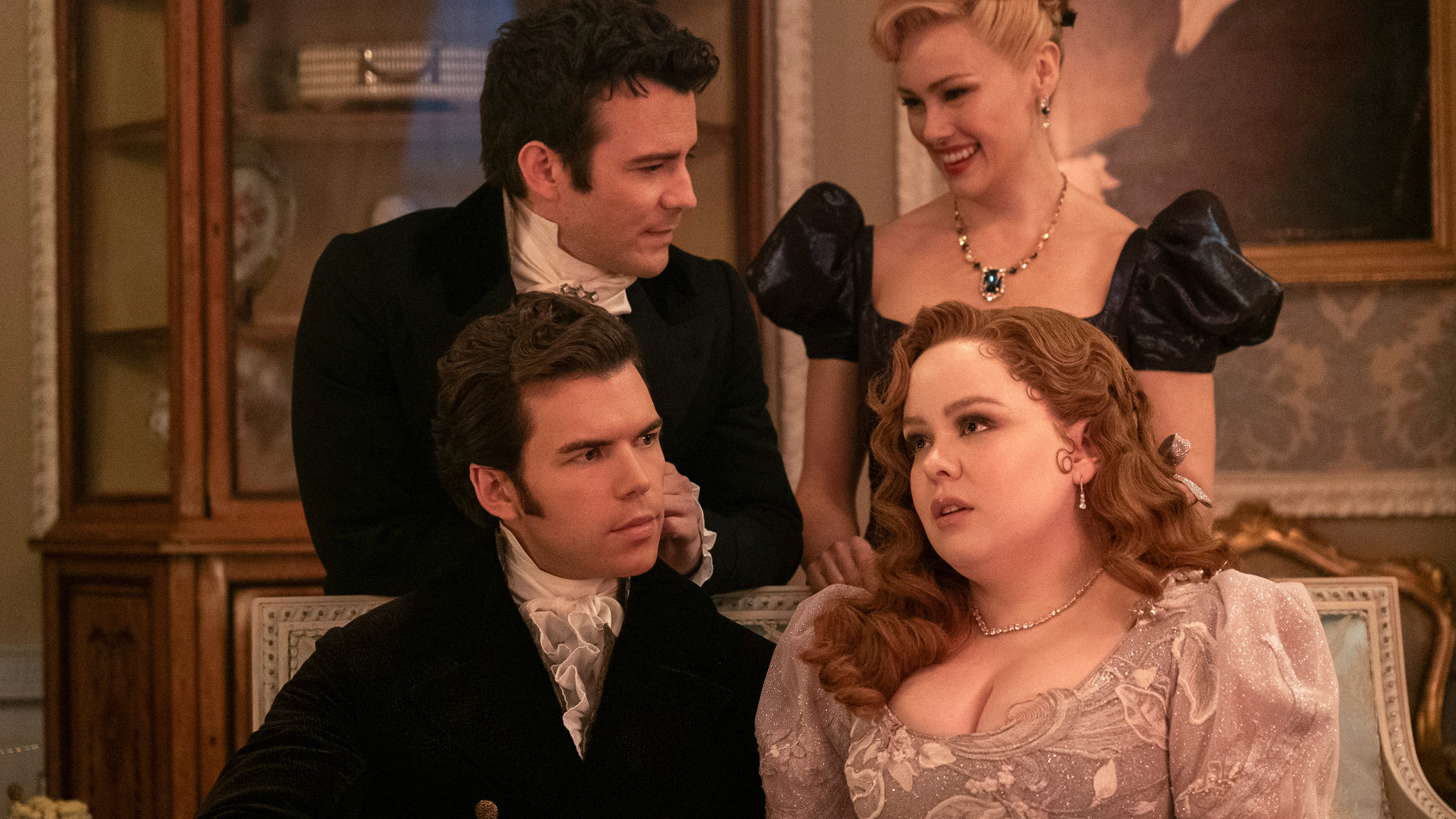 A scene from Bridgerton showing Penelope sitting with Colin