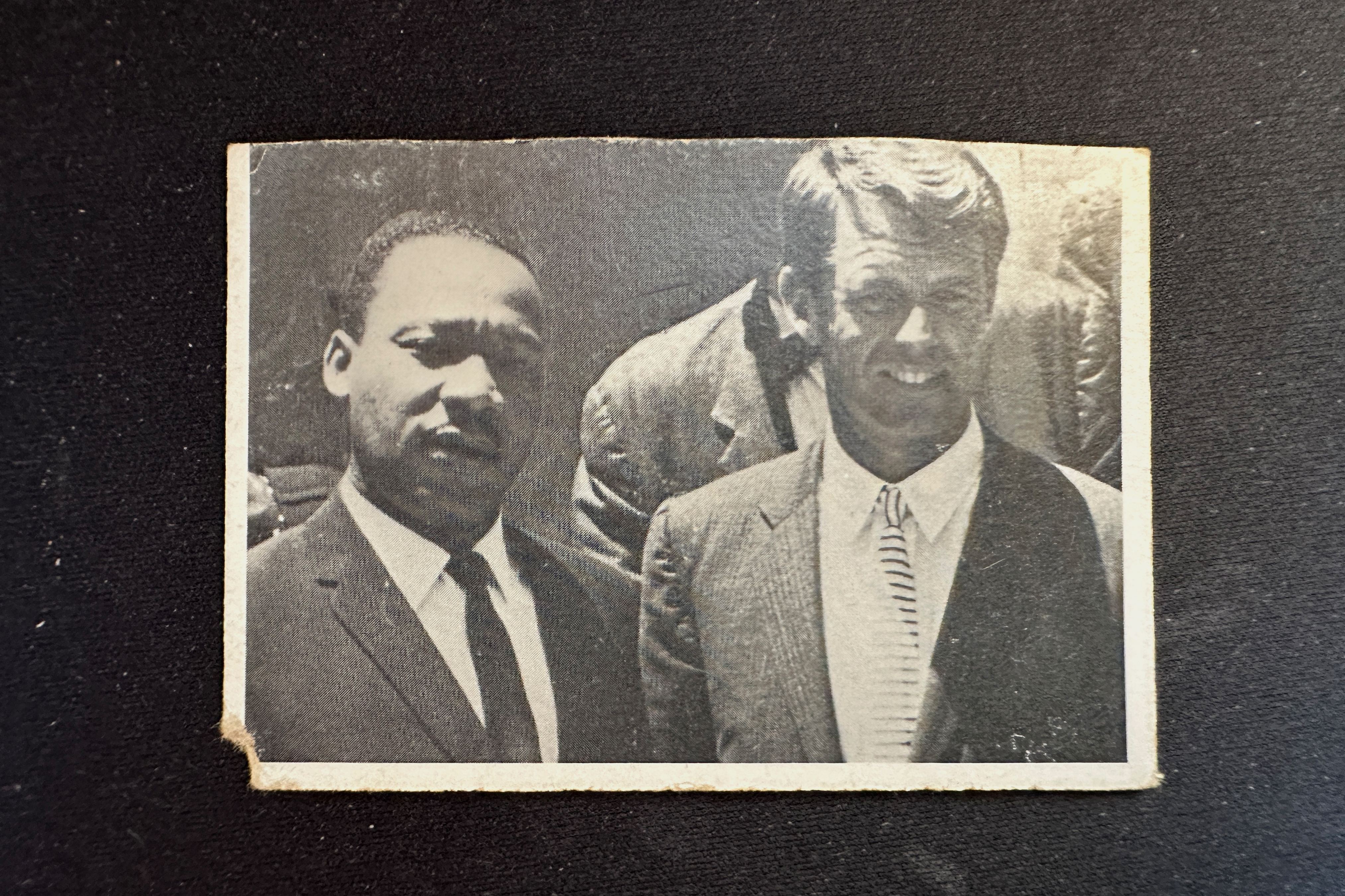 A black-and-white photo of Martin Luther King Jr. and Bobby Kennedy