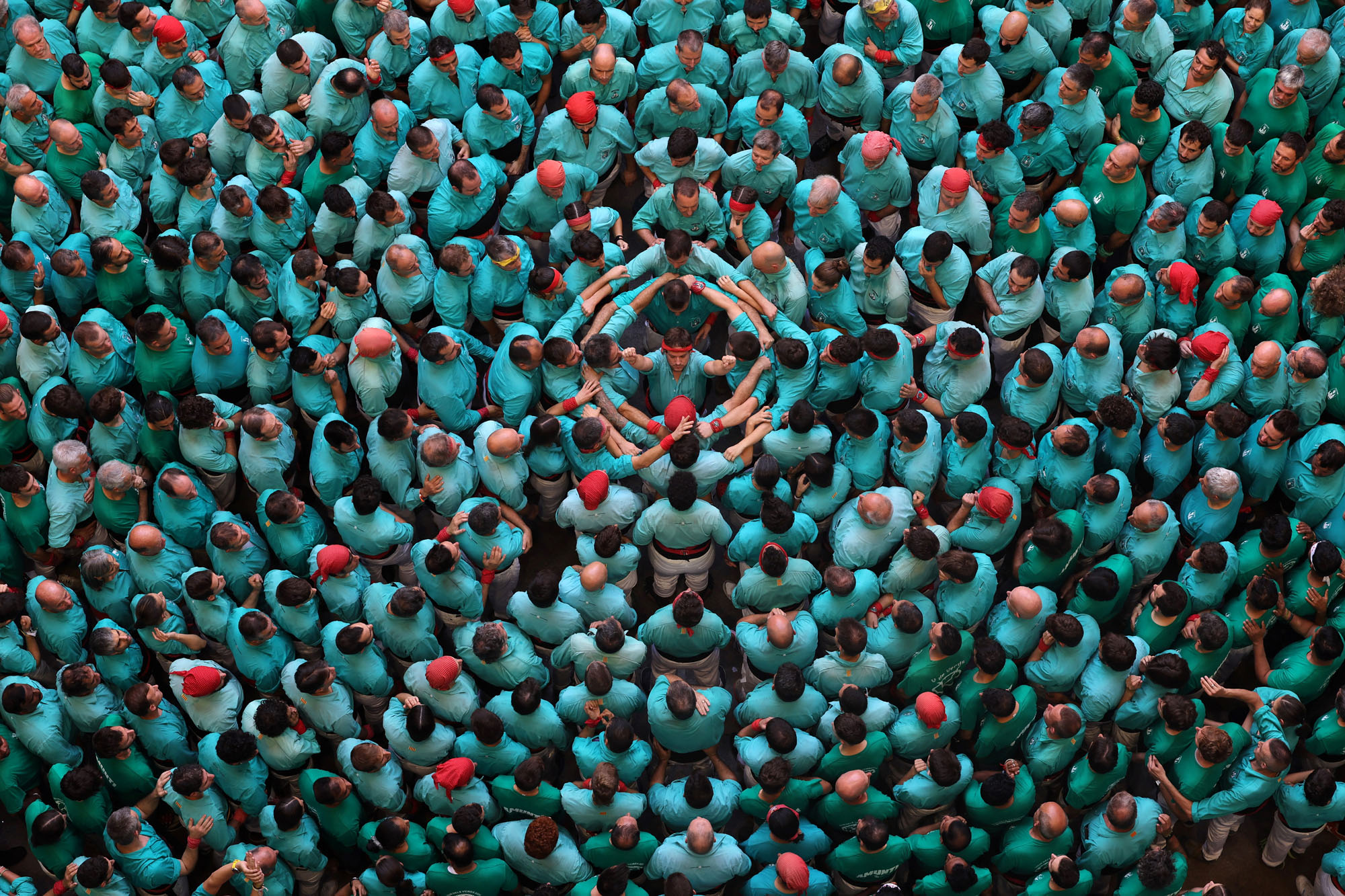 Members of the Castellers de Vilafranca team form a castell.