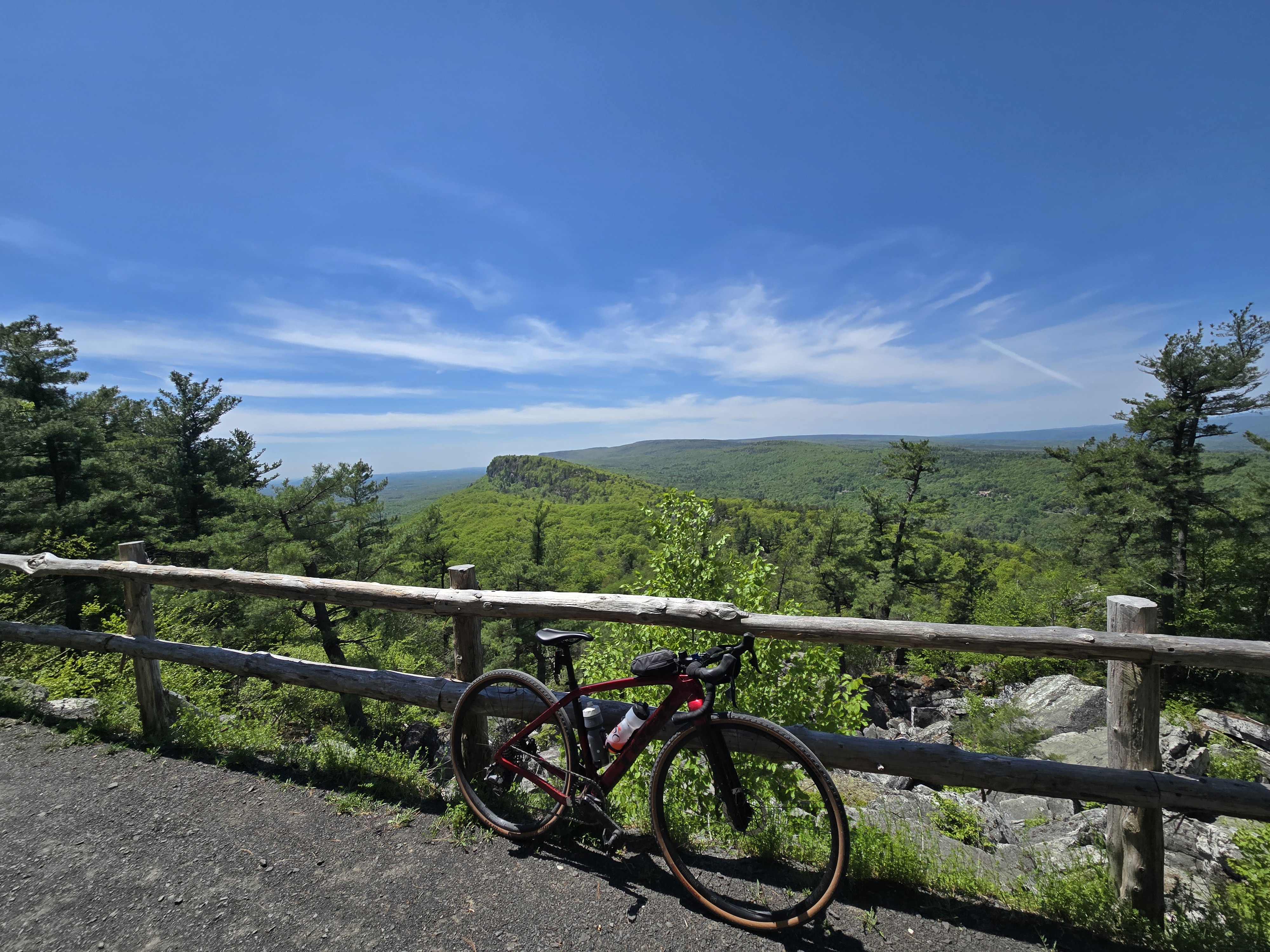 A bike with blue sky and mountains in the distance
